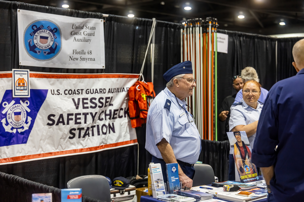 U.S. Coast Guard Auxiliary Flotilla 48 volunteers staff their Vessel Safety Check Station at the Florida Saltwater Fishing Expo.