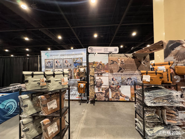 Dry Pocket's waterproof gun bags and coolers on display at the Florida Fishing Expo trade show floor.