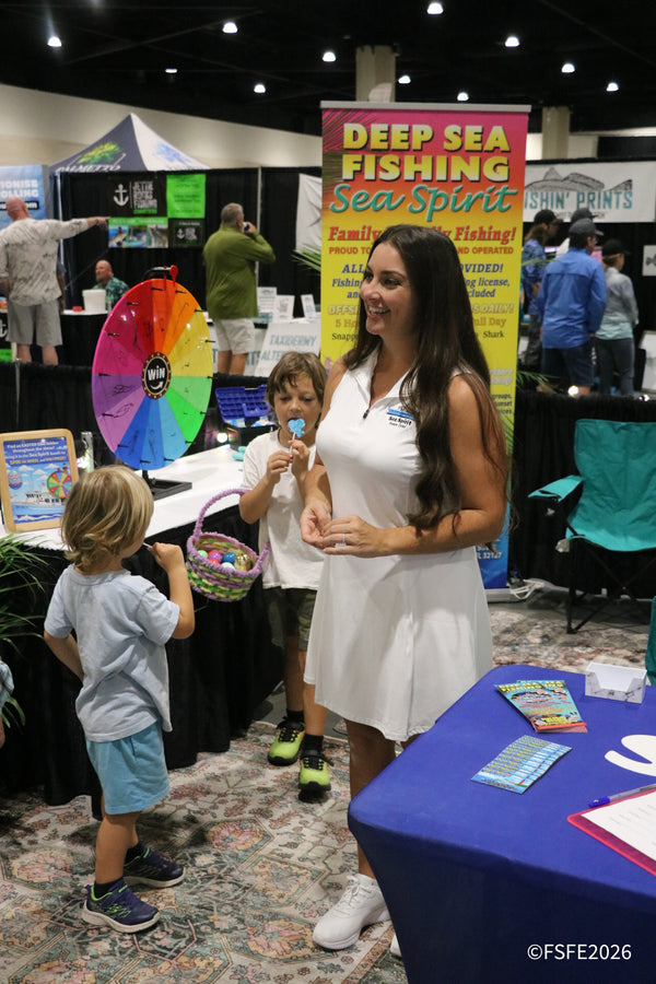 An East Cape center console rigged with Raymarine electronics draws a crowd on the Florida Fishing Expo show floor.