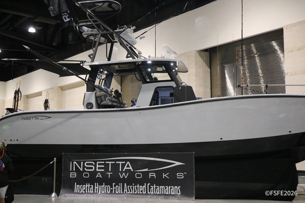 Insetta Boatworks shows off a sleek hydro-foil assisted catamaran fishing boat at the Florida Fishing Expo.