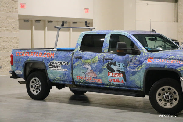 The CCA Florida STAR tournament truck, presented by Yamaha and wrapped with Realtree Fishing branding, parked at the Florida Fishing Expo.