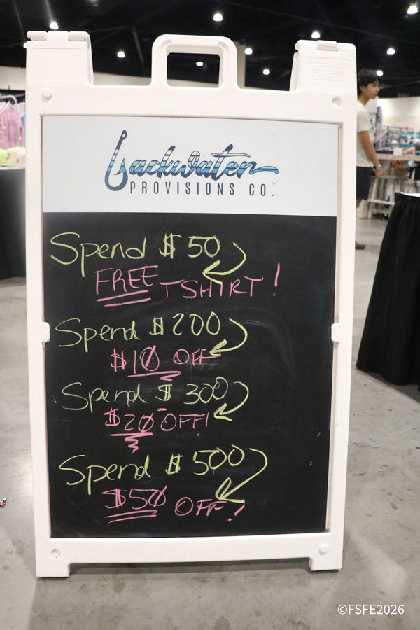 Backwater Provisions Co. tempts shoppers with spend-and-save deals on a hand-lettered chalkboard sign at the Florida Fishing Expo.
