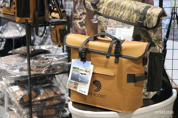 A rugged Dry Pocket waterproof bag on display, one of the gear innovations featured at the Florida Fishing Expo.