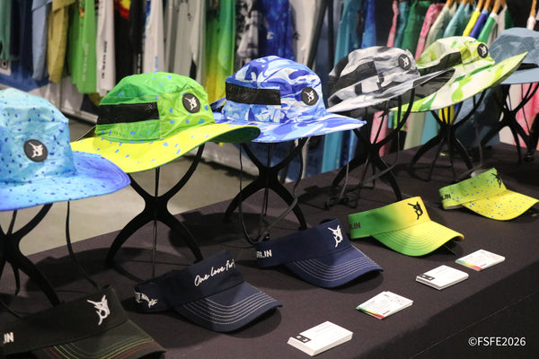 Bob Marlin's colorful sun hats and visors on display at the Florida Fishing Expo.