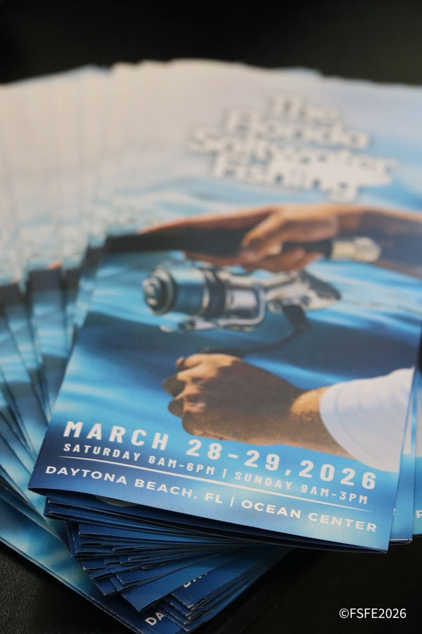 A stack of Florida Fishing Expo event guides ready for attendees at check-in.