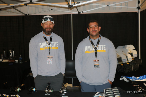 Two smiling Amerikote Performance Ceramic Coatings reps welcome visitors to their Florida Fishing Expo booth.