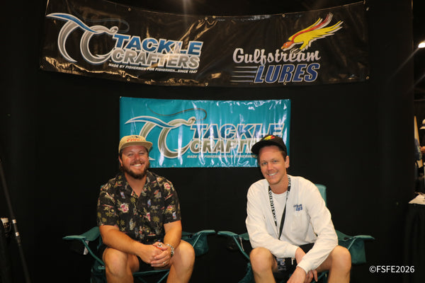Two smiling vendors from Tackle Crafters and Gulfstream Lures pose together at the Florida Fishing Expo.